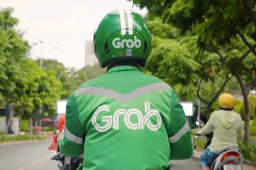 Grab Dikabarkan Cari Pinjaman Rp33,1 Triliun untuk Akuisisi GOTO